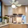 A kitchen scene with a ceiling fan and cabinets. Náhľad obrázku produktu