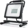A black LED work light with a metal stand is shown against a white background. Náhľad obrázku produktu