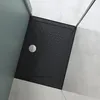 A top-down view of a black shower tray with a silver drain cover. Produktbild-Vorschau