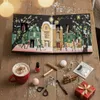 A Christmas-themed advent calendar is open, revealing small beauty products, surrounded by other beauty items and a mug of hot chocolate on a wooden table. Produktbild-Vorschau