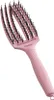 A pink hairbrush with black bristles is shown against a white background. Náhled obrázku produktu