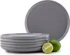 A stack of gray plates with two limes in front of them. Náhled obrázku produktu