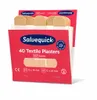 A package of Salvequick textile plasters, showing the front of the box with some plasters peeking out. Anteprima dell’immagine prodotto