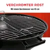 Close-up of a black charcoal grill with a chrome grate, set against a red background. Produktbild-Vorschau