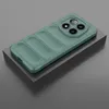 A green phone case with a textured back and a camera cutout is displayed on a gray platform. Produktbild-Vorschau