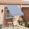 A patio scene with a striped awning extended over a window, a rocking chair, and plants. Produktbild-Vorschau