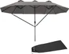 A large, dark gray, multi-sectioned patio umbrella is shown fully open against a white background. Below the umbrella, a folded, dark gray umbrella cover is also visible. Náhled obrázku produktu