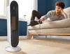 A man relaxing on a couch while a space heater is in the foreground. Produktbild-Vorschau