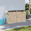 A metal firewood storage rack filled with logs, placed outdoors next to a building. Náhľad obrázku produktu