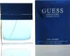 A bottle of Guess Seductive Homme Blue eau de toilette and its packaging are displayed side-by-side against a white background. Voir les images du produit