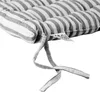 A close-up of a striped cushion with ties. Anteprima dell’immagine prodotto