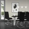 A dining room scene with a table and chairs. Produktbild-Vorschau