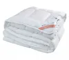 A folded white comforter is shown against a white background. Podgląd zdjęcia produktu