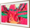 A framed television displaying a vibrant, abstract landscape painting. Voir les images du produit
