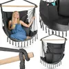 A collage of images showing a woman sitting in a hanging chair, a close-up of the chair's pocket, and a view of the chair itself. Produktbild-Vorschau