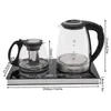 A glass electric kettle and a glass teapot with an infuser sit on a black induction heating base, with dimensions indicated by measurement lines and text. Podgląd zdjęcia produktu