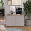 A modern living room with a sideboard, artwork, and a plant. Produktbild-Vorschau