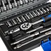 A close-up view of a toolset, showing various sockets and a ratchet wrench. Produktbild-Vorschau