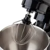 A close-up shot of a kitchen mixer's whisk attachment and bowl. Produktbild-Vorschau