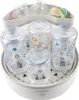 A baby bottle sterilizer with bottles and a pacifier inside. Podgląd zdjęcia produktu