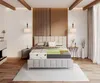 A cutaway view of a mattress on a bed in a modern bedroom. Produktbild-Vorschau