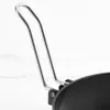A close-up shot of the handle of a cooking utensil, likely a frying pan or omelet mold, against a light-colored, marbled background. Náhled obrázku produktu