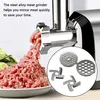A close-up of a meat grinder with minced meat being dispensed, and a set of accessories shown in a circular inset. Produktbild-Vorschau