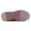 The sole of a shoe is shown against a white background. Voir les images du produit