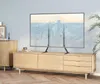 A TV stand with a TV on it, placed on a wooden cabinet in a living room. Náhled obrázku produktu