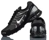 A pair of black Nike Air Max Torch 4 sneakers shown from a side and back angle against a white background. Voir les images du produit
