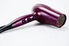 A purple hairdryer is shown on a white background. Podgląd zdjęcia produktu