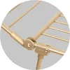 Close-up view of a joint mechanism on a gold-colored drying rack. Produktbild-Vorschau