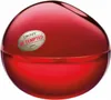 A red, spherical perfume bottle with a label. Podgląd zdjęcia produktu
