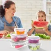 A mother and daughter are in a kitchen, preparing food and using food storage containers. Produktbild-Vorschau