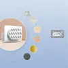 A white smartphone wall mount with adhesive backing is shown, surrounded by circular images representing different surface textures and a separate image of an adhesive pad. Produktbild-Vorschau
