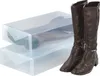 Two clear plastic boot storage boxes are stacked, with a pair of brown leather boots placed next to them. Produktbild-Vorschau