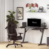 A gaming setup with a chair, desk, computer, and accessories in a room. Produktbild-Vorschau