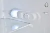 Close-up of the interior of a refrigerator, showing the light and temperature control dial. Produktbild-Vorschau