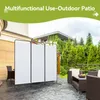 An outdoor patio scene with a three-panel room divider set up, featuring outdoor furniture and lush greenery in the background. Podgląd zdjęcia produktu
