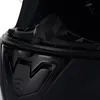 A close-up view of the interior and exterior details of a black helmet. Náhled obrázku produktu