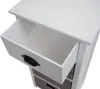 A close-up view of a white wooden chest of drawers with one drawer pulled open, revealing woven gray baskets below. Anteprima dell’immagine prodotto
