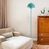 A living room scene with a chaise lounge, a wooden cabinet, a floor lamp, and a rug. Voir les images du produit