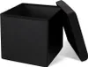 A black storage ottoman with its lid partially open, shown against a white background. Náhled obrázku produktu
