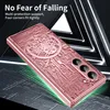 A rose gold phone case with a detailed mechanical design is shown on a dark, textured surface with green light effects emanating from underneath. Anteprima dell’immagine prodotto