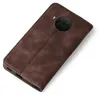 A brown leather flip case for a smartphone is shown on a white background. Produktbild-Vorschau