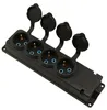 A black electrical power strip with four Schuko outlets, each with a protective cover. Anteprima dell’immagine prodotto
