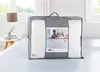 A duvet in its packaging on a bed. Produktbild-Vorschau
