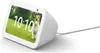 A white Amazon Echo Show 5 smart display with a dog and a ball on the screen. Produktbild-Vorschau
