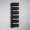 A black radiator mounted on a white wall. Produktbild-Vorschau