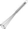 A stainless steel whisk with a cylindrical handle and a loop at the end, set against a white background. Produktbild-Vorschau